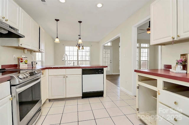 kitchen featuring dishwasher, a sink, white cabinets, and stainless steel electric stove