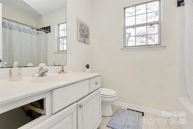 full bathroom with toilet, vanity, baseboards, visible vents, and tile patterned floors