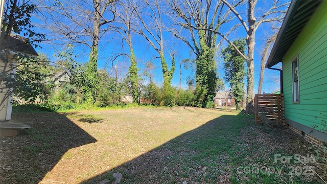 view of yard featuring fence