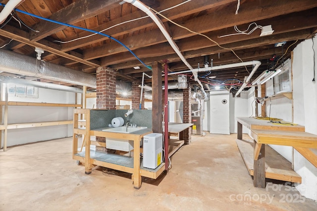 below grade area featuring heating unit