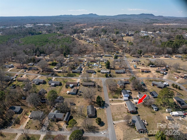 drone / aerial view featuring a mountain view