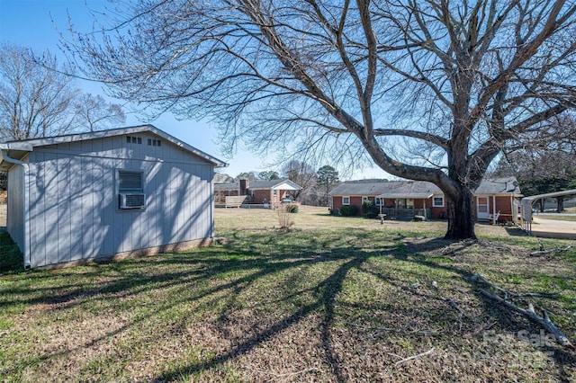 view of yard featuring fence and cooling unit