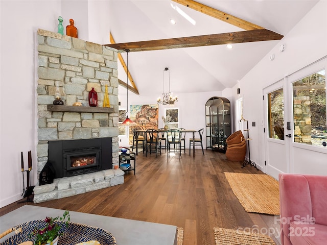living area with dark wood-style flooring, a fireplace, high vaulted ceiling, beamed ceiling, and baseboards