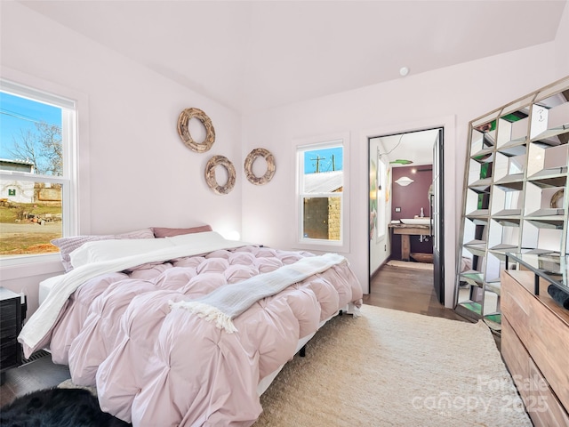 bedroom with wood finished floors