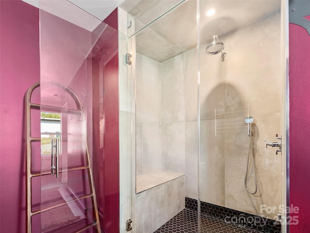 bathroom featuring tiled shower