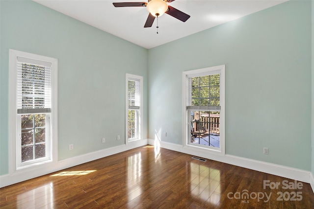 941 Wash Freeman Rd, Hendersonville, NC 28792 - empty room featuring ceiling fan, wood finished floors, and baseboards
