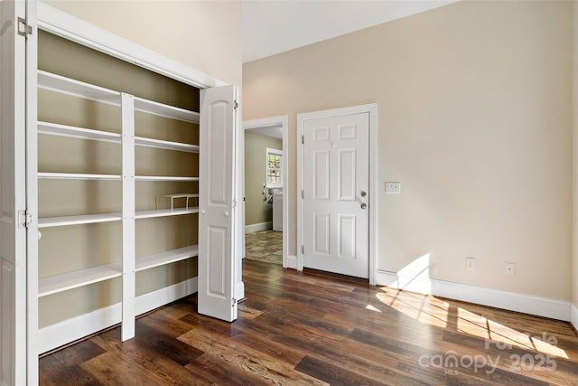 941 Wash Freeman Rd, Hendersonville, NC 28792 - entrance foyer with dark wood-type flooring and baseboards