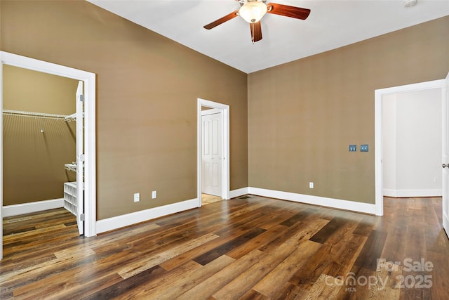 941 Wash Freeman Rd, Hendersonville, NC 28792 - unfurnished bedroom featuring baseboards, wood finished floors, and ceiling fan