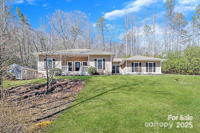 941 Wash Freeman Rd, Hendersonville, NC 28792 - back of house featuring covered porch and a yard