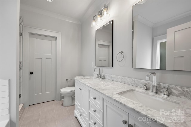 full bathroom with ornamental molding, a sink, and toilet