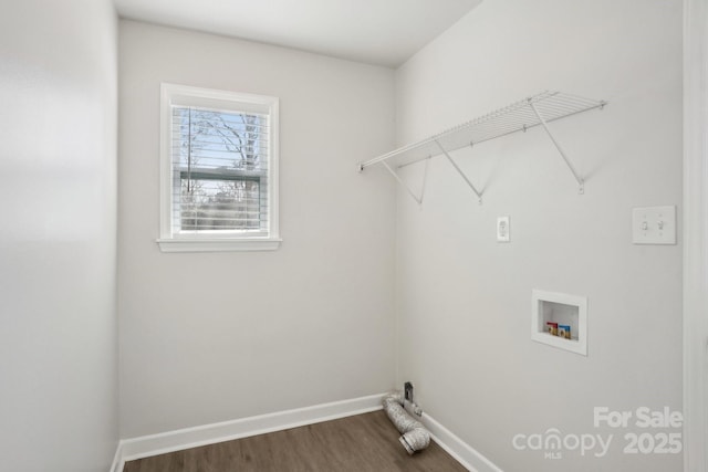 laundry area with laundry area, hookup for a washing machine, baseboards, and dark wood-type flooring