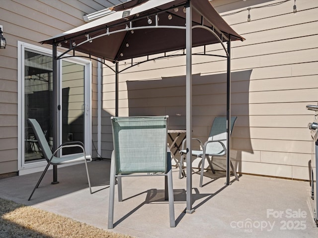 view of patio featuring a gazebo