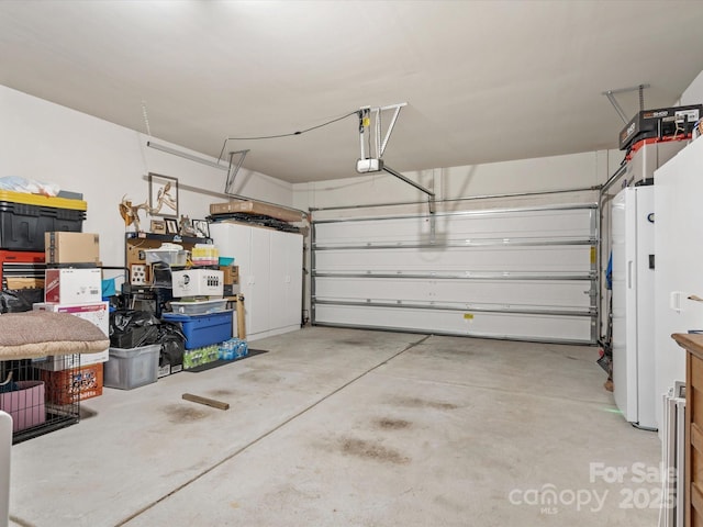 garage with freestanding refrigerator