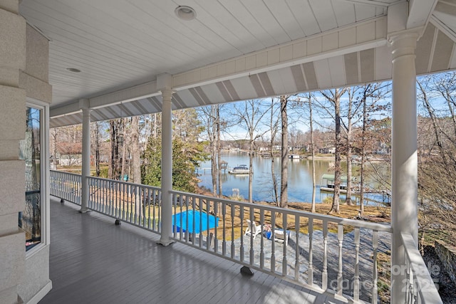 deck featuring a water view