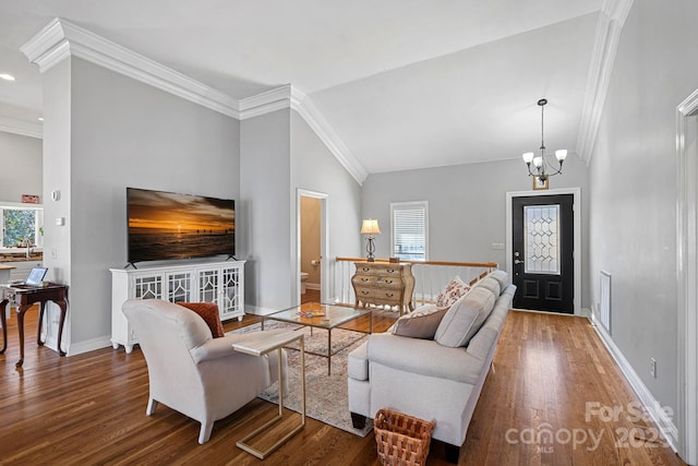 living room featuring dark wood-style floors, baseboards, and crown molding