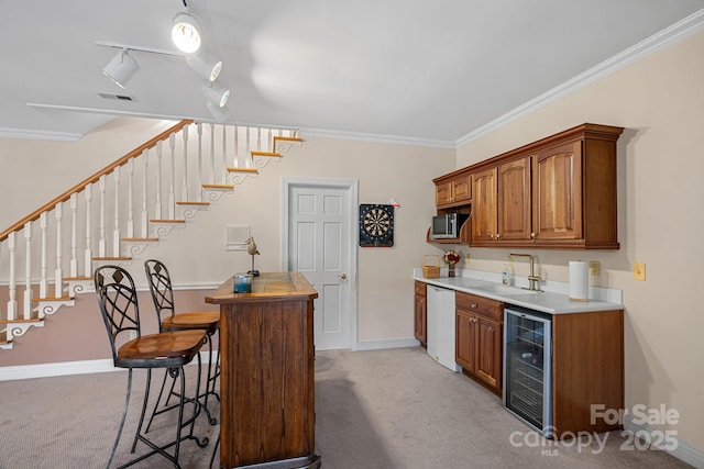 bar featuring wine cooler, light colored carpet, dishwasher, and a sink