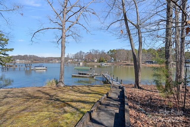 dock area featuring a water view