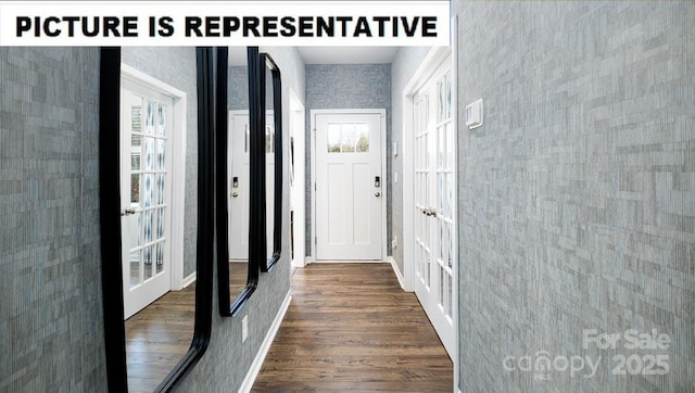 hall with dark wood-type flooring, french doors, baseboards, and wallpapered walls