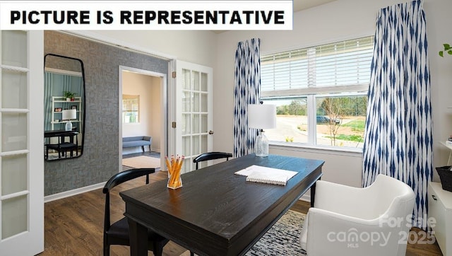 office area with french doors, wood finished floors, and baseboards