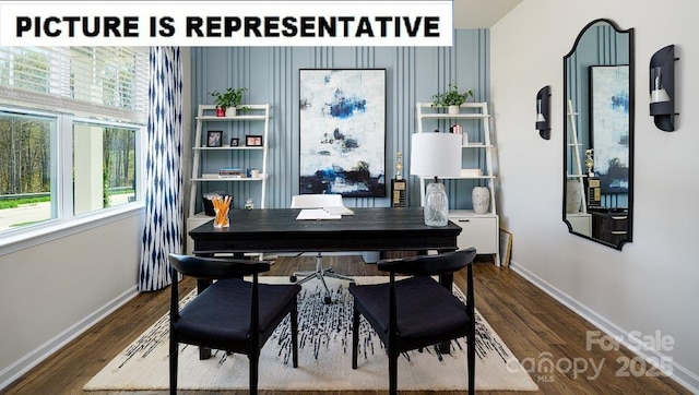 dining space with baseboards and dark wood-style flooring