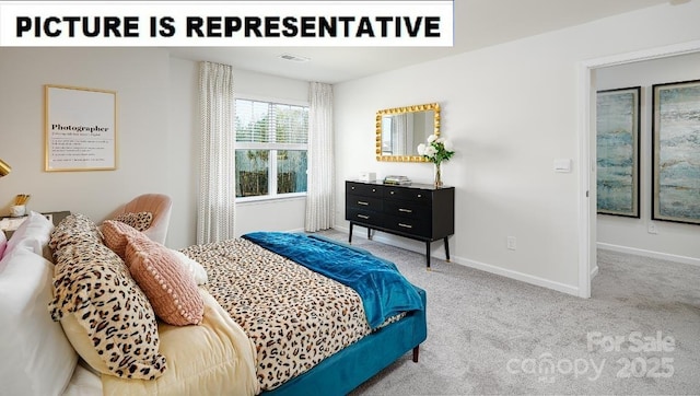 carpeted bedroom with visible vents and baseboards