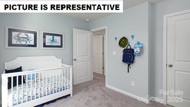 carpeted bedroom with baseboards