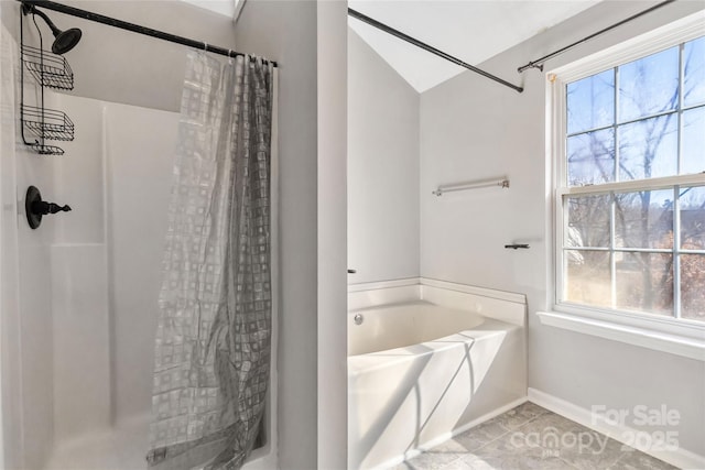 full bathroom with a shower stall, baseboards, a bath, and tile patterned floors