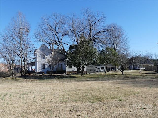 view of yard with a carport