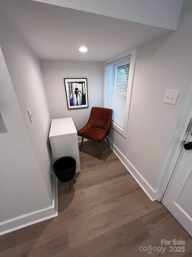 sitting room with recessed lighting, wood finished floors, and baseboards