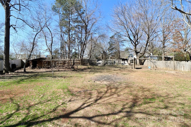 view of yard with a fenced backyard