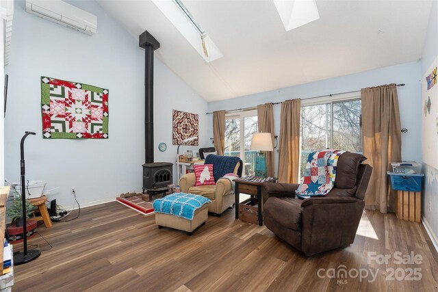sitting room featuring a wall mounted air conditioner, a skylight, wood finished floors, high vaulted ceiling, and a wood stove