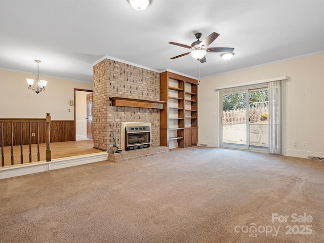 unfurnished living room with ornamental molding, carpet, and visible vents