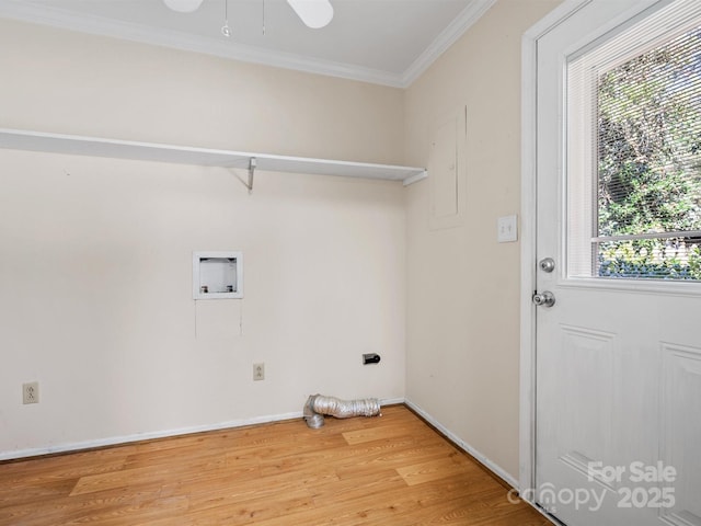 washroom with washer hookup, crown molding, wood finished floors, laundry area, and baseboards