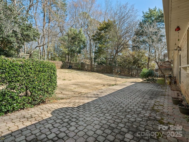 view of patio with a fenced backyard