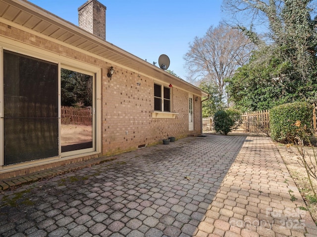 view of patio / terrace with fence