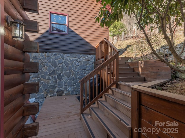 wooden deck featuring stairway