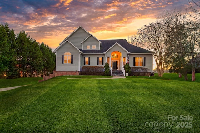 view of front of home featuring a lawn