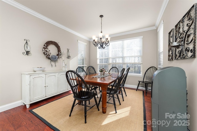 dining room featuring baseboards, an inviting chandelier, dark wood finished floors, and crown molding