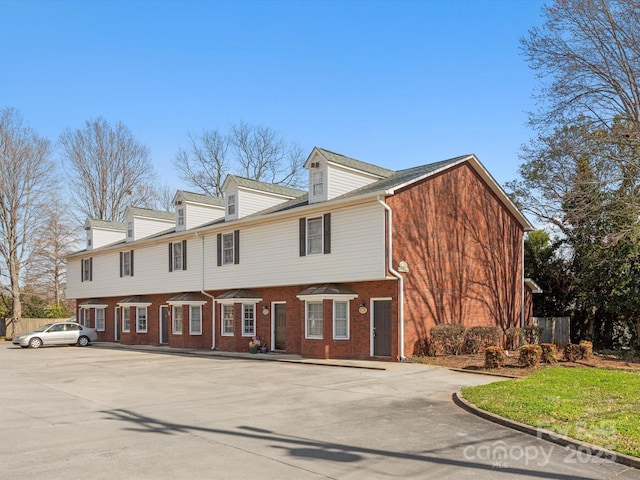 multi unit property with brick siding