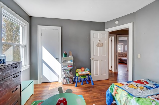 bedroom featuring wood finished floors