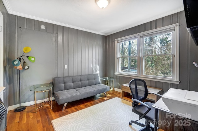 home office with crown molding, baseboards, and wood finished floors