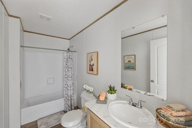 full bathroom featuring shower / tub combo with curtain, visible vents, toilet, ornamental molding, and vanity