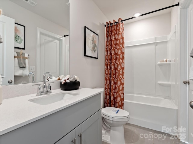 bathroom with tile patterned flooring, toilet, visible vents, vanity, and shower / tub combo with curtain