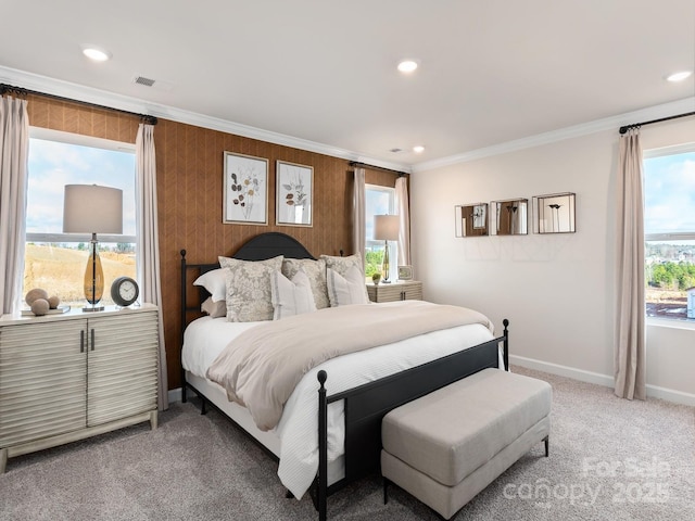 bedroom featuring light carpet, recessed lighting, baseboards, and crown molding