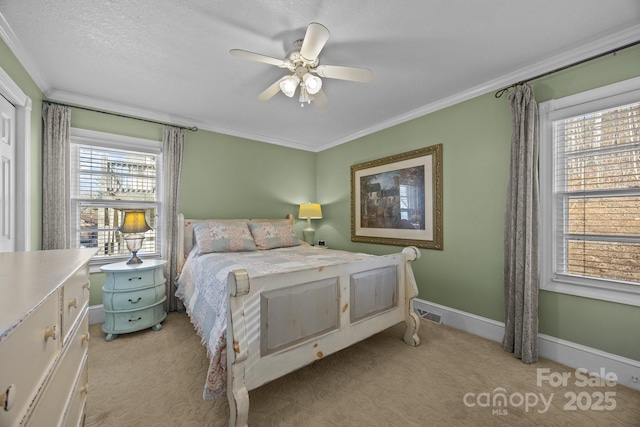 bedroom featuring crown molding, visible vents, light carpet, ceiling fan, and baseboards