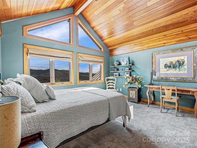 bedroom with lofted ceiling, wooden ceiling, carpet, and baseboards