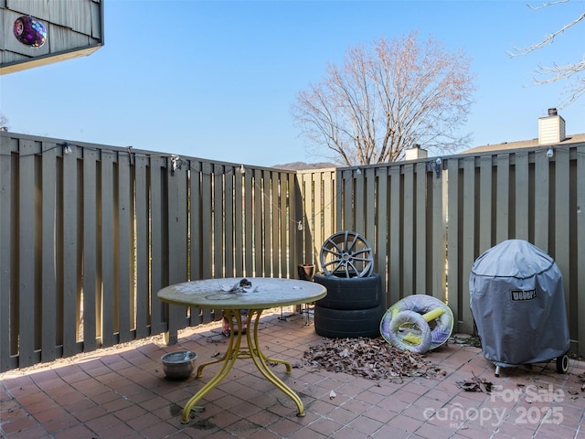 view of patio / terrace featuring a grill