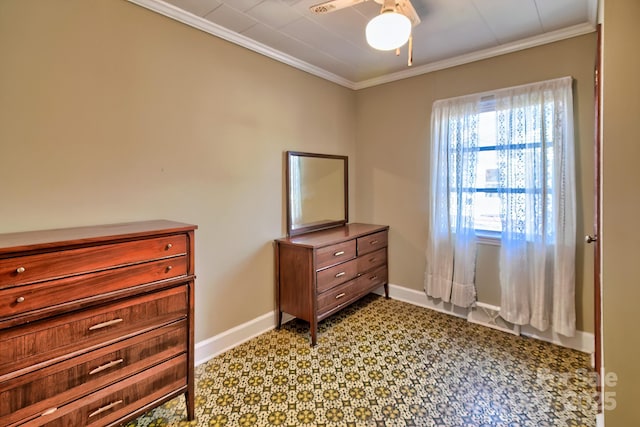 bedroom with ceiling fan, baseboards, and crown molding