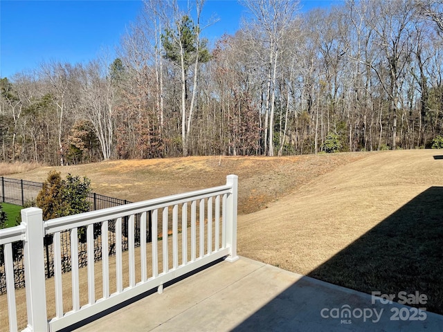 view of patio / terrace featuring fence