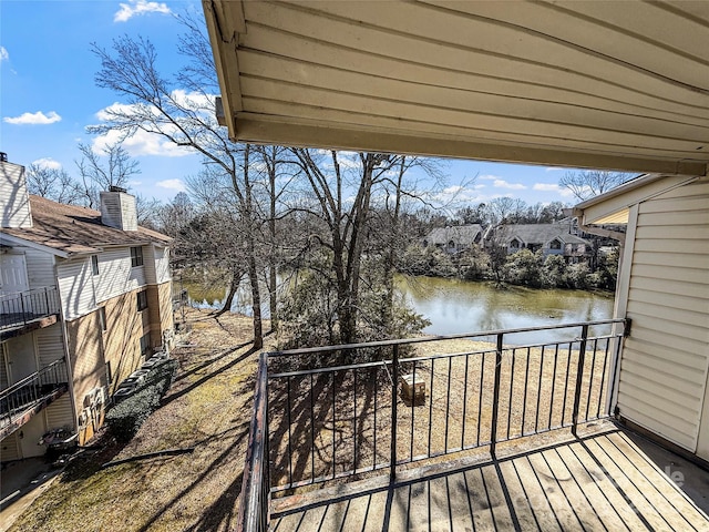 deck featuring a water view